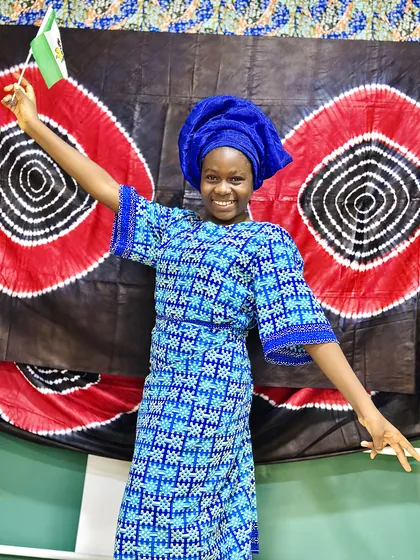 A child dressed in Nigerian colours celebrating Independence Day at Aquila Nidus