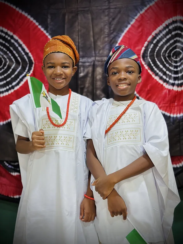 Two children celebrating Independence Day together at Aquila Nidus